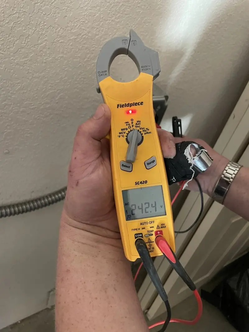 Voltage testing with clamp meter during Circuit Breaker Repair in Kildeer